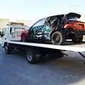 خدمة سحب السيارات على منصة مسطحة والمساعدة على الطريق في قطر